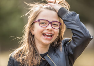 Girl With Glasses and Braces Laughing | GSO