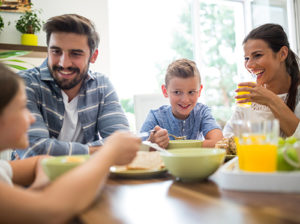 Family Eating Breakfast Smiling | GSO