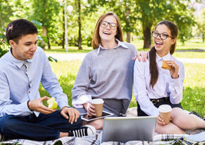 Three Teens at a Picnic Laughing | GSO